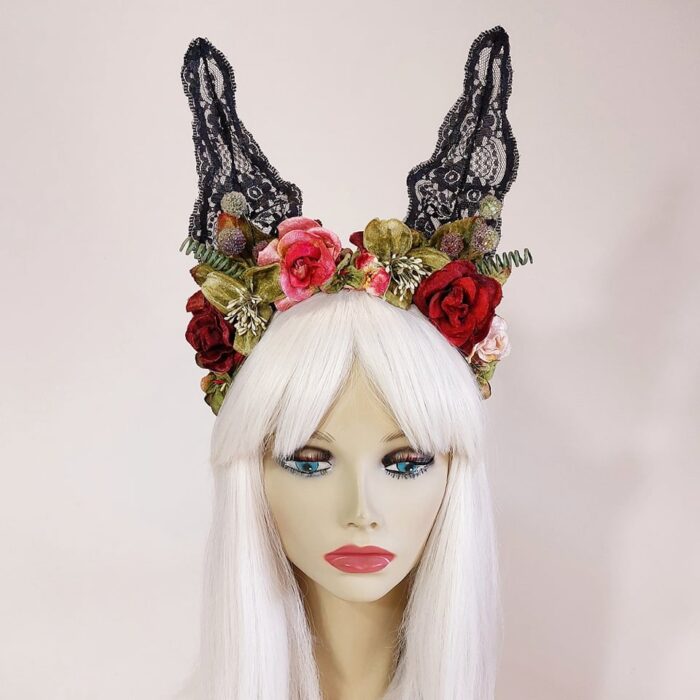 a black lace bunny headpiece with velvet roses and flowers