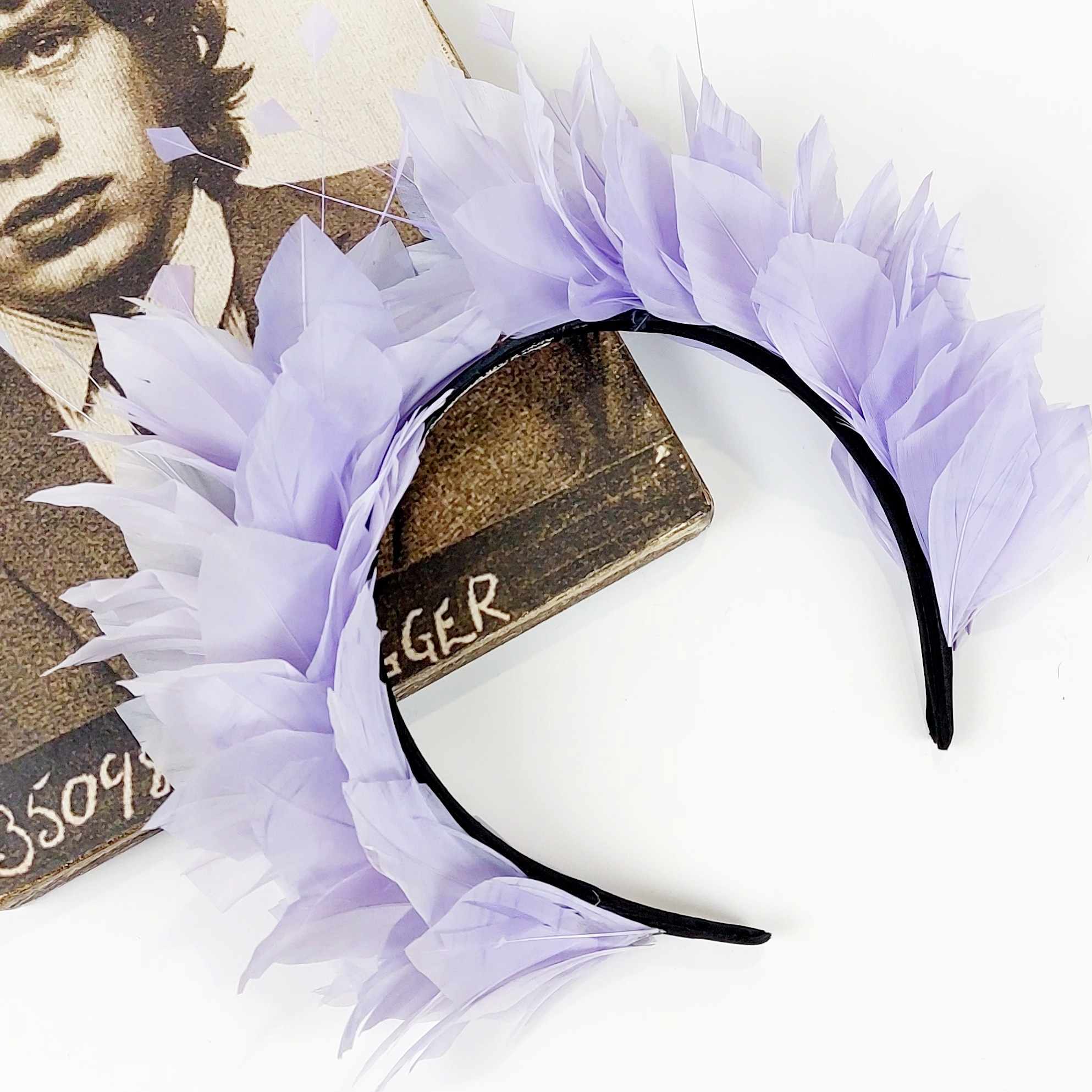 lilac purple feather fascinator crown for the races