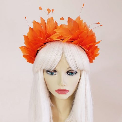 a stunning orange feather headpiece