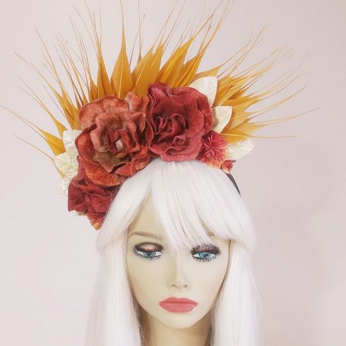 a fascinator in colours of the sunset