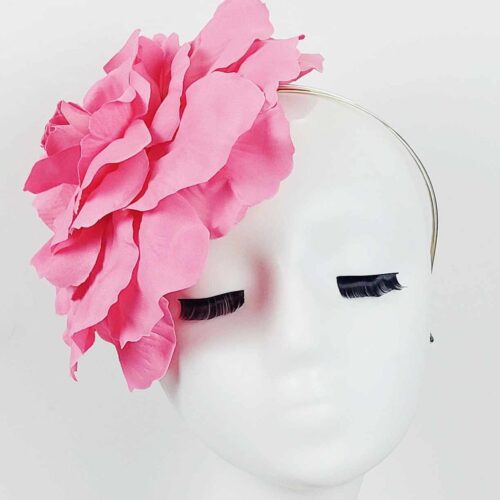 single oversized large candy pink flower fascinator headpiece wear to the race