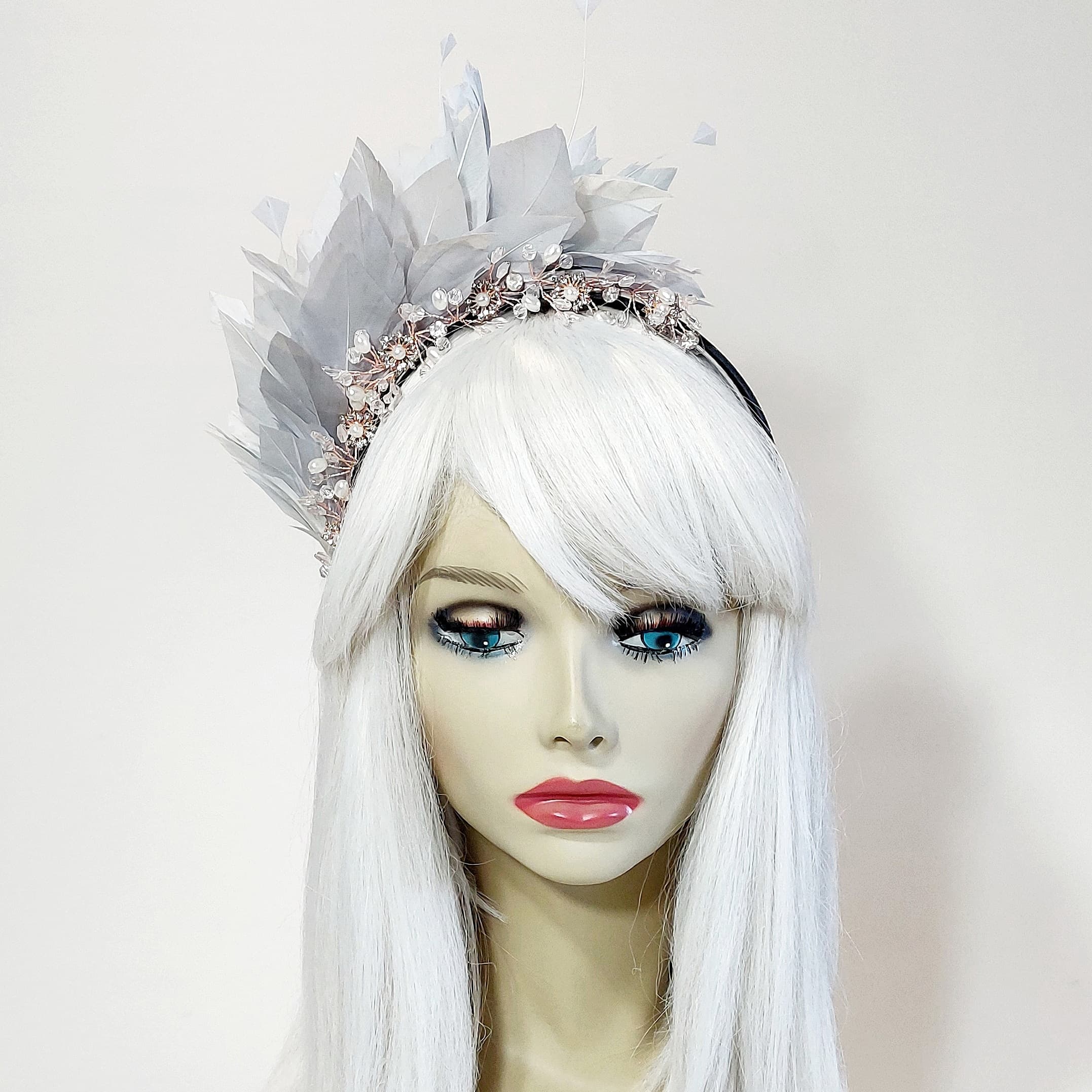 grey feathered headpiece for the races