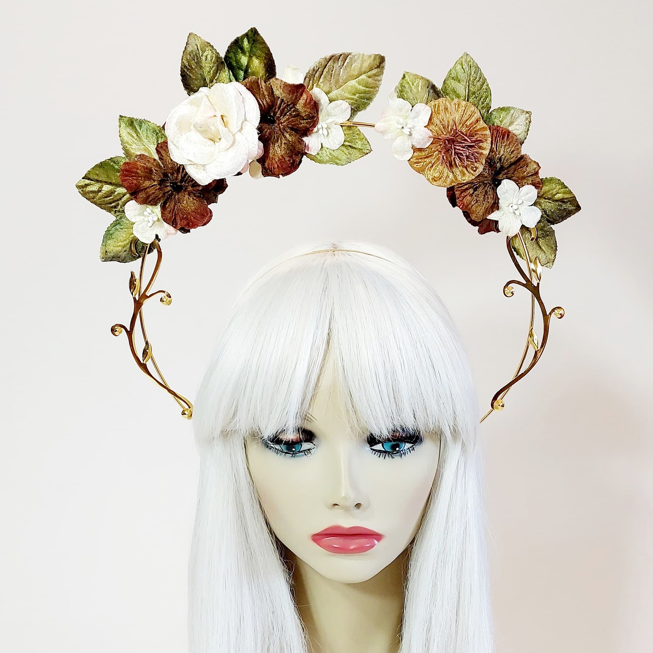 gorgeous velvet flowers designed on a gold metal halo headband