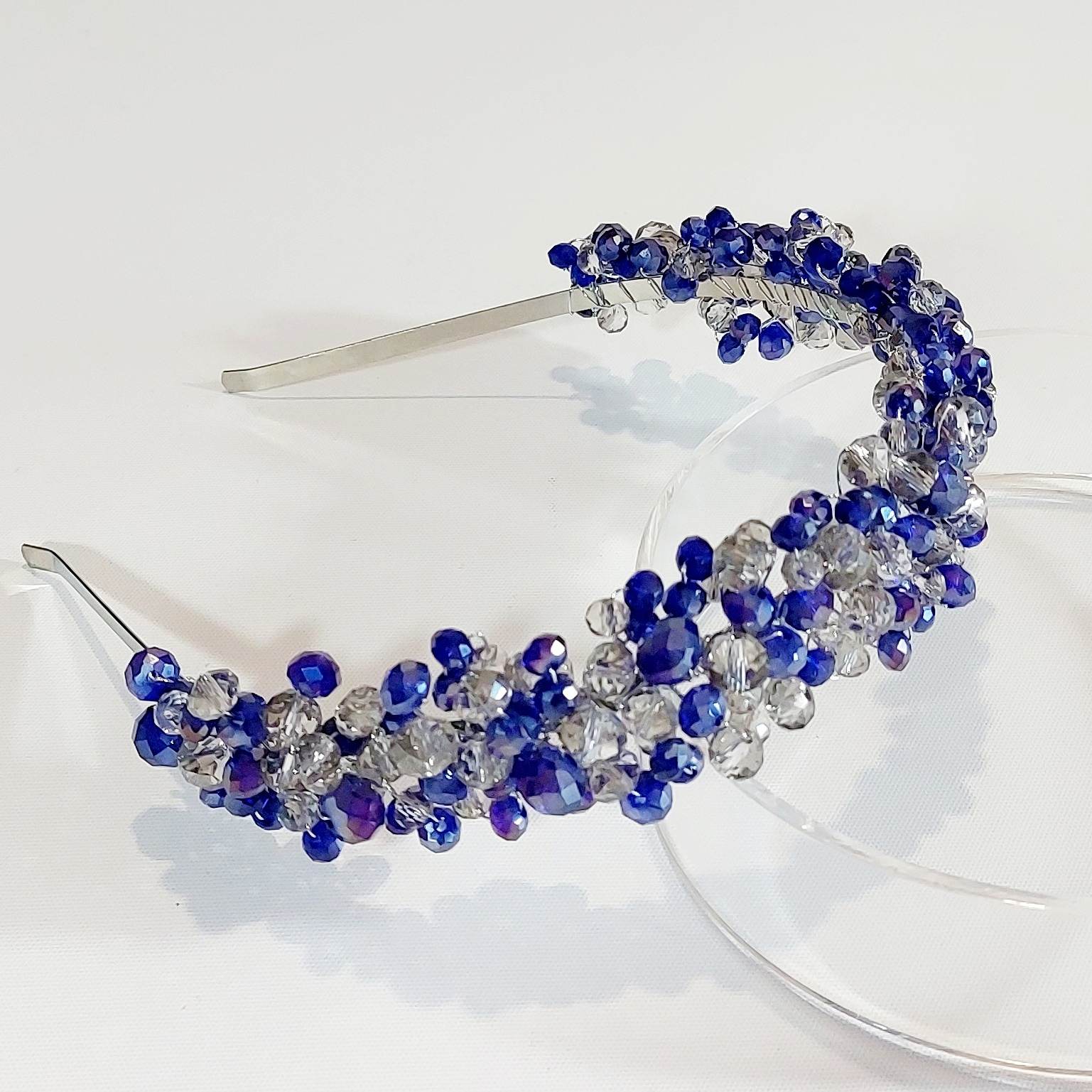 a vintage style blue crystal headband for the races
