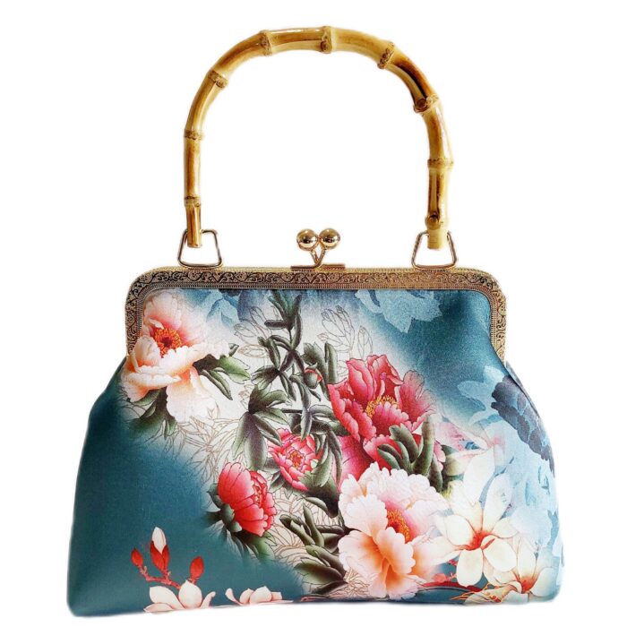 a divine floral print handbag with bamboo handle