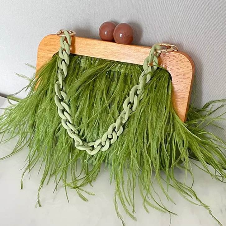 whimsical feather handbag in green