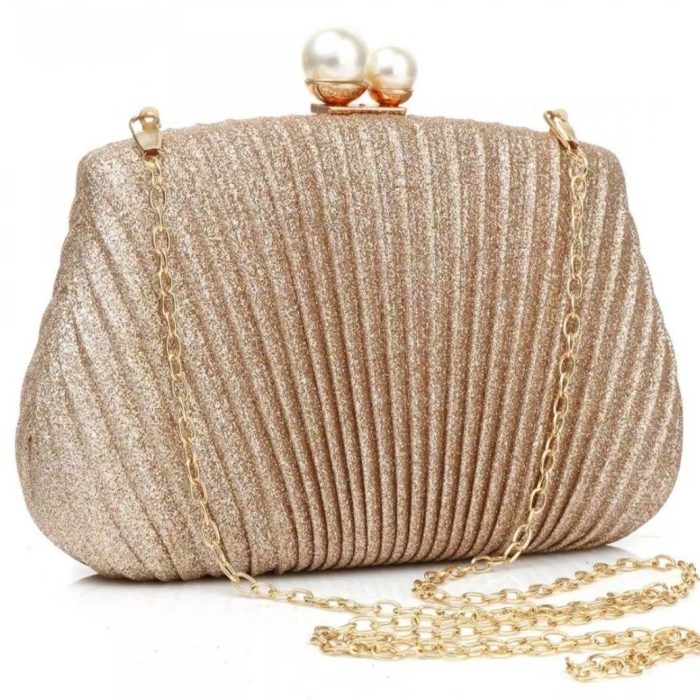 a stunning rose gold and pearl clutch