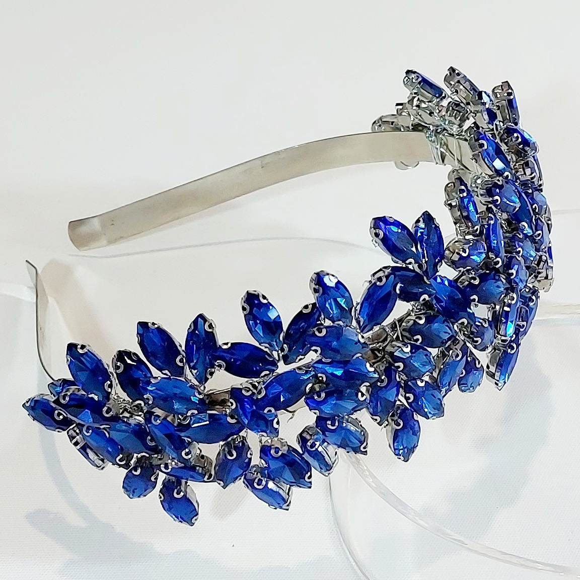 a stunning sparkling headpiece with royal blue diamantes for the races, formal or special event