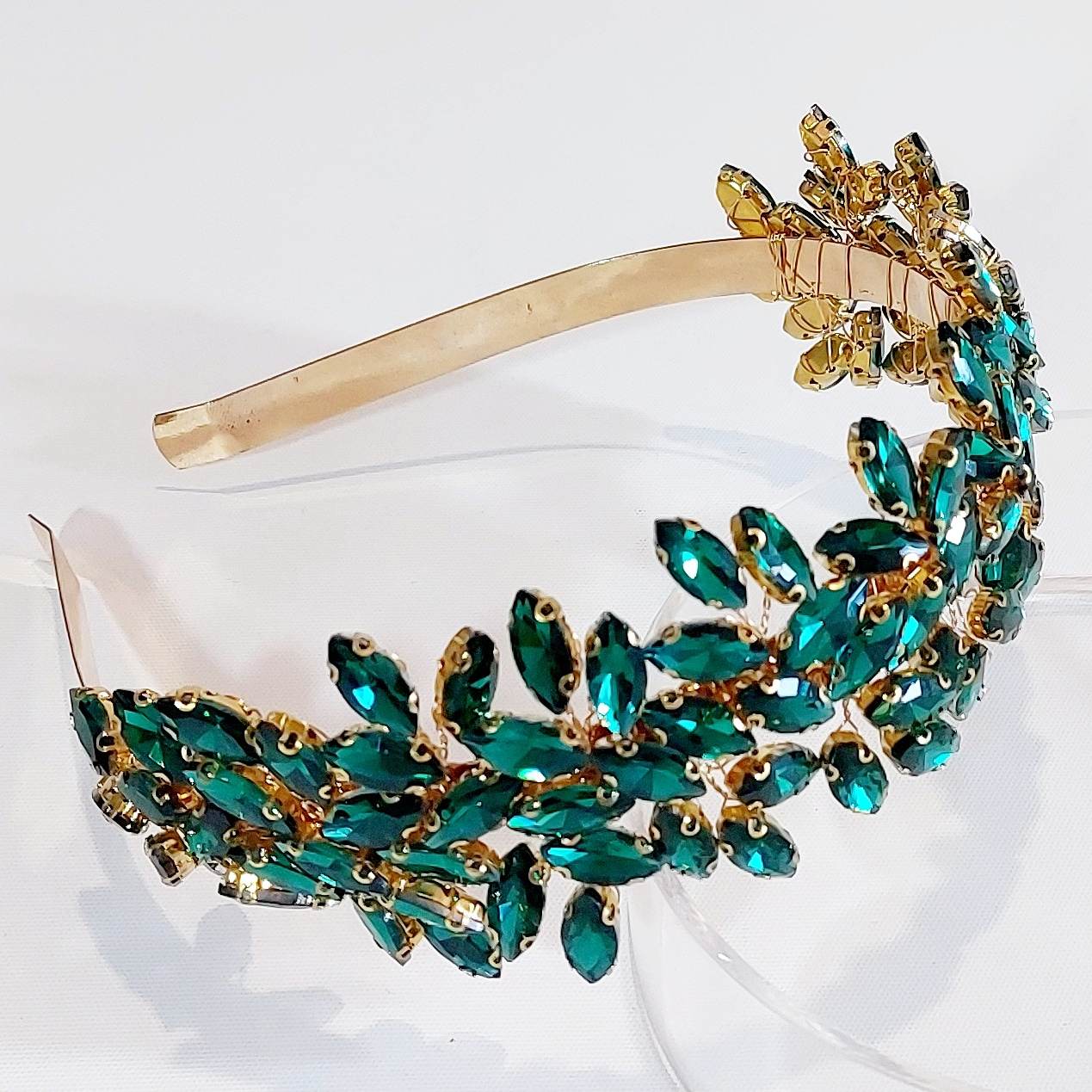 a stunning green diamante crystal headpiece to wear to the races, formal or special event