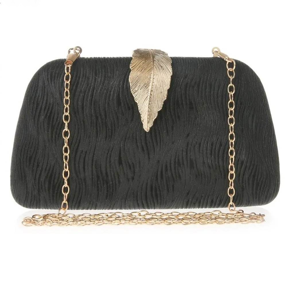 a stunning black shimmer clutch for the races and evening wear
