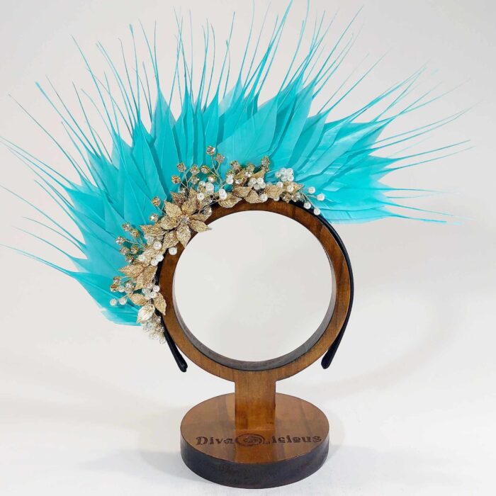 wear this aqua blue and gold jeweled headpiece to the races