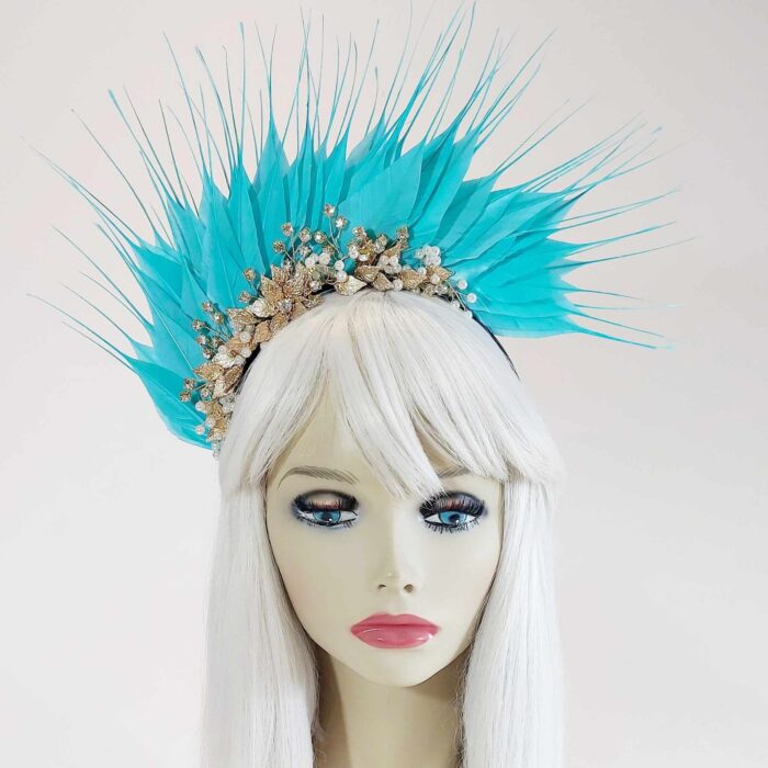 wear this aqua blue and gold jeweled headpiece to the races