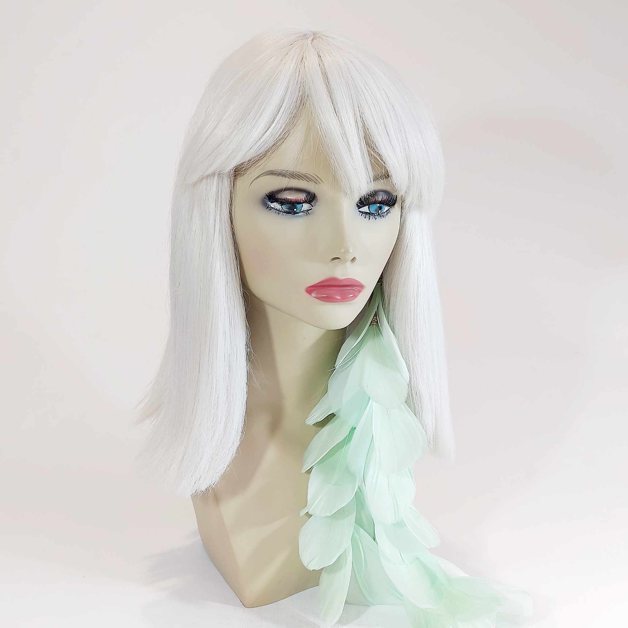 wear divalicious feather hair clip in mint to festivals