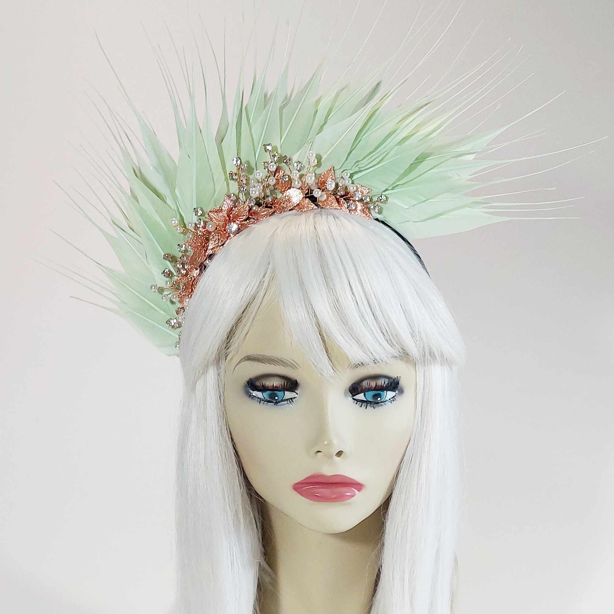 beautiful mint green feather headpiece for the races