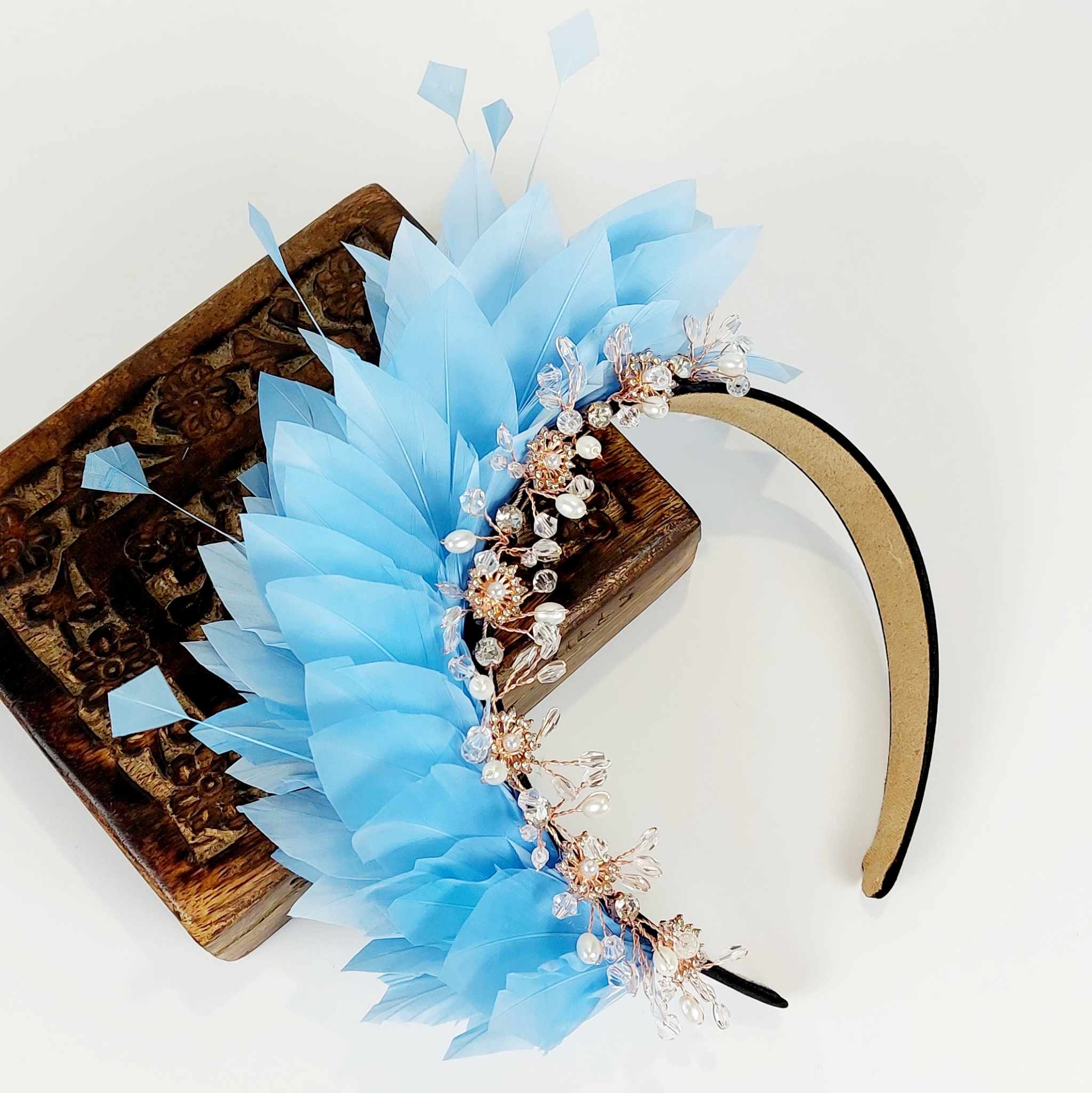 soft light blue feather fascinator jewelled crown for the races